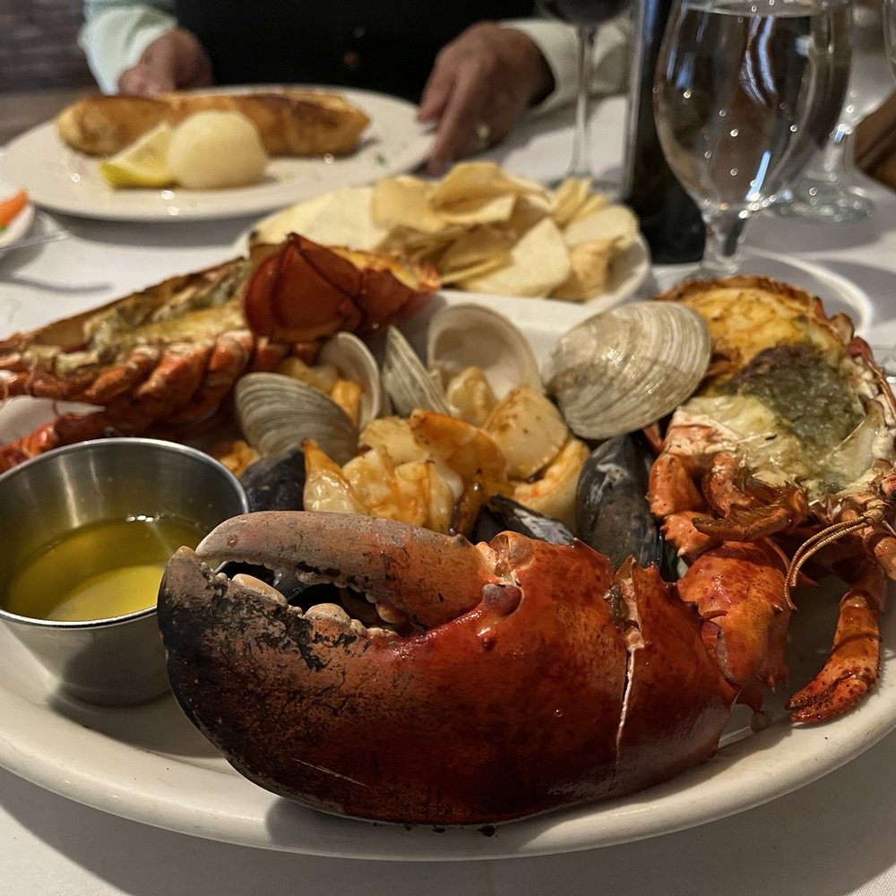 Don Pepe - a plate of lobster and clams - Spanish Near Me - Newark, New Jersey Don Pepe - a plate of lobster and clams - Spanish Near Me - Newark, New Jersey