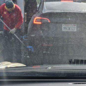 Jarvis Shell - The poor car in front of me, the attendant used the same brush from the wheel/bottom of the car on the entire exterior of the car. - Gas Stations Near Me - Newark, California