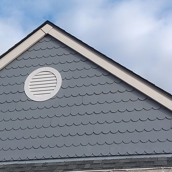 Skyscape Construction - Made panels from 4 x 8 sheets , painted , then hug the siding - General Contractors Near Me