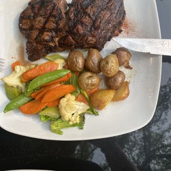 Fireside Bistro - a steak and vegetables on a plate - Bistros Near Me - Regina, Saskatchewan