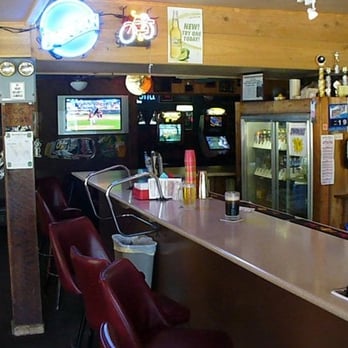 Caddy Shack - a bar with red chairs - Bars Near Me - Council Bluffs, Iowa