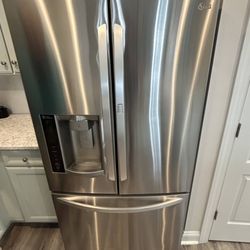Quick Reliable Appliance Repair - GE French door refrigerator repair - resolved cooling and water dispenser issues for this stainless steel model.