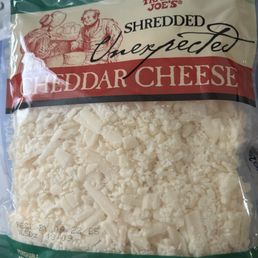 Shredded unexpected cheddar cheese