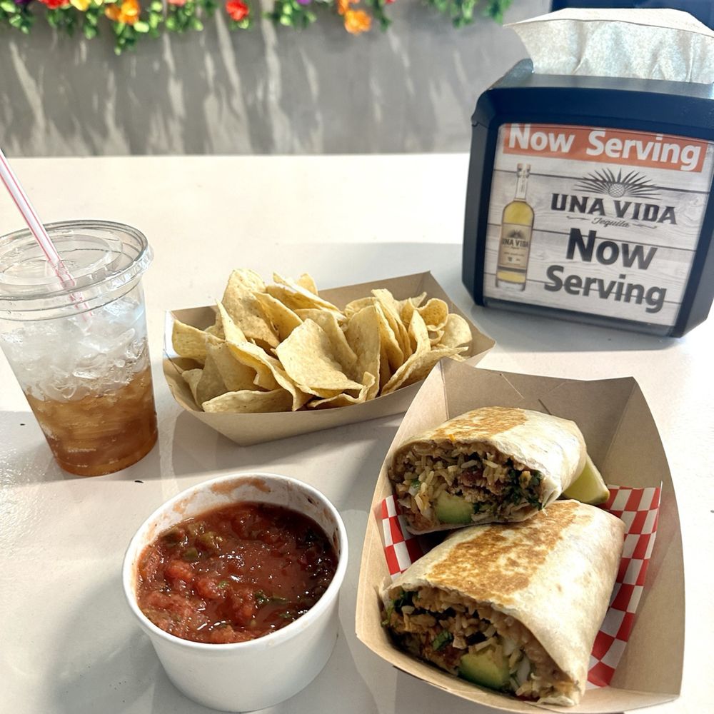 Chicken burrito and chips with salsa Chicken burrito and chips with salsa