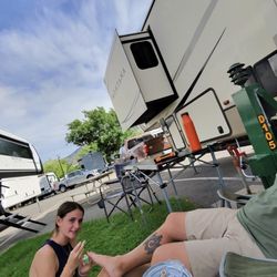 Reno KOA at Boomtown - Outdoor grass pad between our 2 trailers