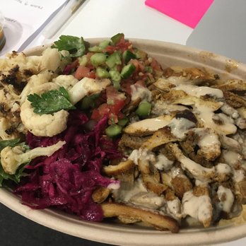Sababa - Bowl with chicken, with layer of hummus underneath, and a side of cauliflower, Israeli salad, and red cabbage. Garlic sauce on top :) - Mediterranean Near Me - San Francisco, California Sababa - Bowl with chicken, with layer of hummus underneath, and a side of cauliflower, Israeli salad, and red cabbage. Garlic sauce on top :) - Mediterranean Near Me - San Francisco, California