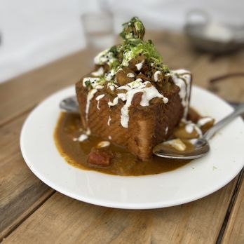 Nue - South African Bunny Chow - Tapas/Small Plates Near Me - Seattle, Washington Nue - South African Bunny Chow - Tapas/Small Plates Near Me - Seattle, Washington