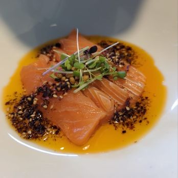 LUVI Restaurant - Scottish salmon, popcorn sunflower seed, micro green with crispy chili oil - Asian Fusion Near Me - New Orleans, Louisiana LUVI Restaurant - Scottish salmon, popcorn sunflower seed, micro green with crispy chili oil - Asian Fusion Near Me - New Orleans, Louisiana