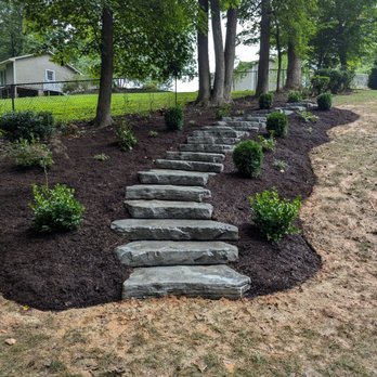 Mr Malaga Landscape - New steps and plants installed down steep hill - Tree Services Near Me