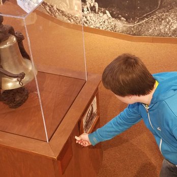 Michigan Iron Industry Museum - Ringing the ship's bell. Actually, I'm not certain it is a bell from a ship. Definitely is a bell though. - Landmarks & Historical Buildings Near Me - Negaunee, Michigan Michigan Iron Industry Museum - Ringing the ship's bell. Actually, I'm not certain it is a bell from a ship. Definitely is a bell though. - Landmarks & Historical Buildings Near Me - Negaunee, Michigan