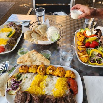 Maman Joon Kitchen Tysons - (left to right) lamb kabob; combo 3* with rice; combo 3* with salad  *combo 3: chicken and chenjeh kabob - Persian/Iranian Near Me - Tysons, Virginia