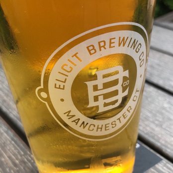 Elicit Brewing Co - Manchester - Peach Mango Cider - Breweries Near Me - Manchester, Connecticut