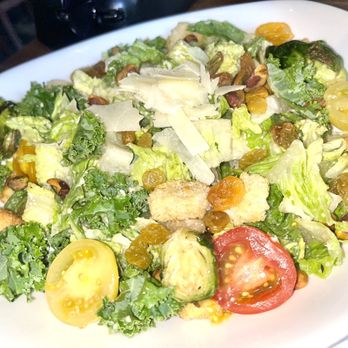 Yard House - Kale & Romaine Caesar Salad   Roasted Brussels sprouts, pistachios, raisins, baby t, Parmesan - New American Near Me - Washington, DC, District of Columbia