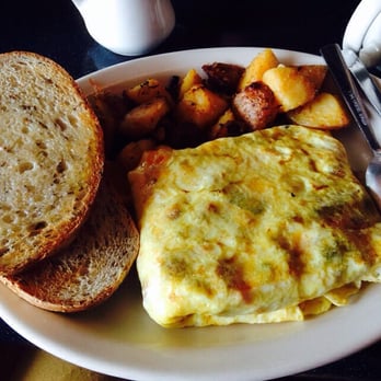 Betty's - Chorizo, peppers and onion omelette with Rye toast and home fries - New American Near Me - Buffalo, New York Betty's - Chorizo, peppers and onion omelette with Rye toast and home fries - New American Near Me - Buffalo, New York