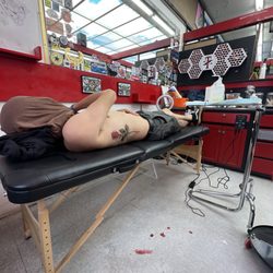 Tattoo Zoo - Rose on the ribs by Trace