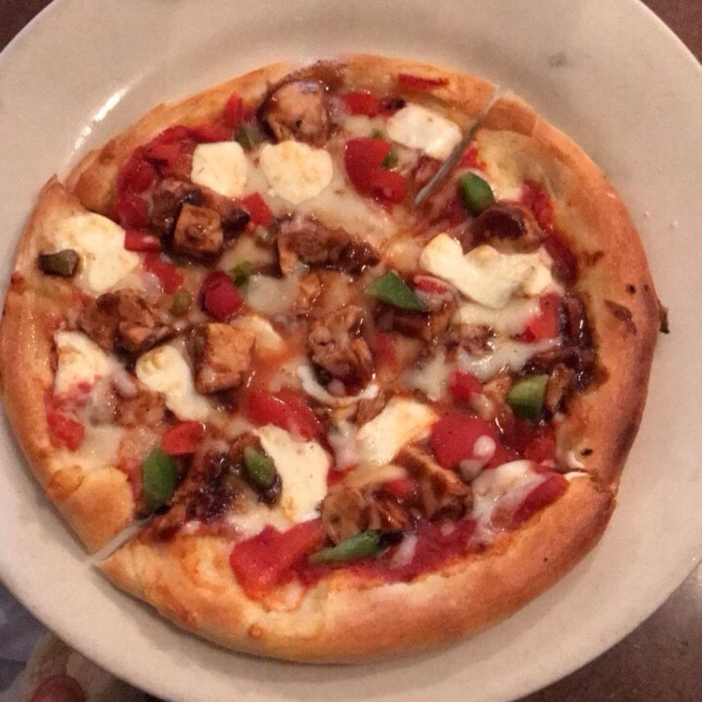 Monica's - Daily special pizza (personal size)-- bbq chicken, roasted red peppers, green peppers, and mozzarella cheese with a red sauce. Very tasty! - Italian Near Me - Coralville, Iowa
