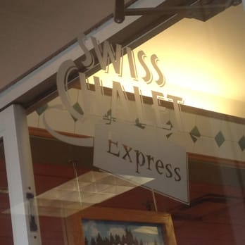 Harvey’s - a sign that says swiss express - Burgers Near Me - Scarborough, Ontario