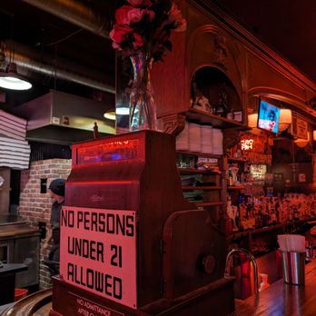 Dino's Tomato Pie - a sign on the bar - Pizza Near Me - Seattle, Washington Dino's Tomato Pie - a sign on the bar - Pizza Near Me - Seattle, Washington