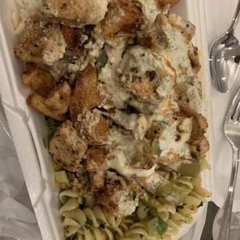 Eli's Table - Chicken souvlaki with rice, home fries, pasta salad and bean salad. SOOOOO good and such a huge portion for small!! - Mediterranean Near Me - Toronto, Ontario