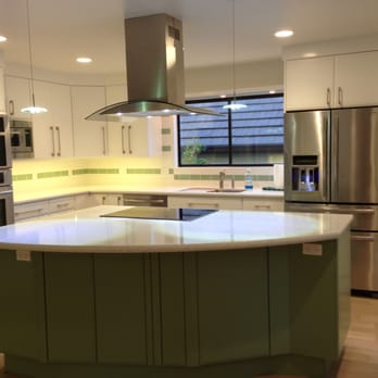 FGDA Construction - a kitchen with a center island - General Contractors Near Me