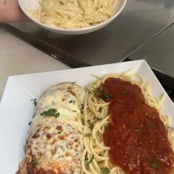 Mama’s Italian House - Fettuccine Alfredo and chicken Parmesan with a side of pasta
