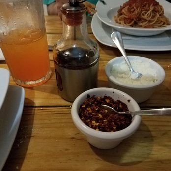 O'Sole Mio - The extra dried peppers and the hot oil for La J's (aka The Quen) Arrabbiata pasta - Pizza Near Me - Puerto Aventuras, ROO