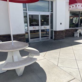 In-N-Out Burger - Front door with operating hours - Burgers Near Me - Riverside, California