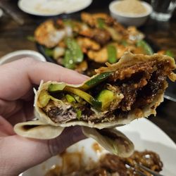 Hunan Taste - What's inside a Peking Duck wrap (cucumber, scallions and delicious duck & skin)
