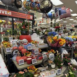 A packed section of seasonal flowers and gifts