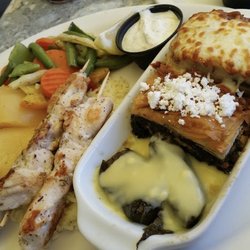 Albert's Bistro Family Restaurant - Greek Sampler-lemon roast potatoes, authentic mousaka, spanikopida, dolmades, souvlaki and home made tzakiki!!!