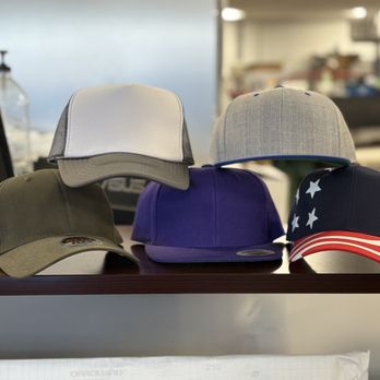 Artistic Apparel, Graphics & Signs - hat examples - Graphic Design Near Me - Aurora, Colorado Artistic Apparel, Graphics & Signs - hat examples - Graphic Design Near Me - Aurora, Colorado