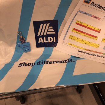 ALDI - a shopping cart with a blue and white striped cover - Grocery Near Me - Rochester, New York