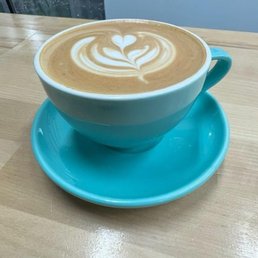My friends cappuccino with great art. I also had the flat white with almond milk. Yum! My friends cappuccino with great art. I also had the flat white with almond milk. Yum!