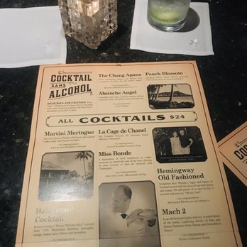 L'Aperitif - Menu and cucumber water - Cocktail Bars Near Me - Honolulu, Hawaii