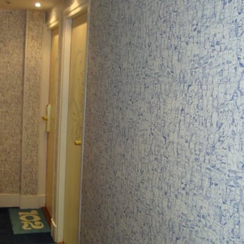 Hotel Crayon by Elegancia - The wallpaper on each floor was different. Ours featured a bunch of sketches and caricatures. - Hotels Near Me - Paris, 75