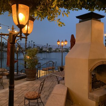Mélange - Outside patio with outdoor fireplace. Lake view! - Cocktail Bars Near Me - La Quinta, California Mélange - Outside patio with outdoor fireplace. Lake view! - Cocktail Bars Near Me - La Quinta, California