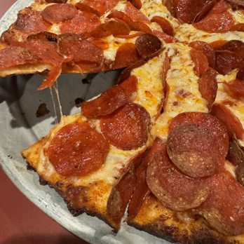 Abby's Legendary Pizza - Side shot, same pizza - Pizza Near Me - Gresham, Oregon Abby's Legendary Pizza - Side shot, same pizza - Pizza Near Me - Gresham, Oregon