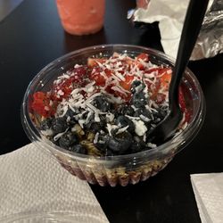 Smoothie bowl with chia, blueberries, strawberries, and coconut flakes!
