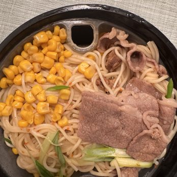 Naks Cafe - Wagyu Ramen with spicy garlic broth. Plastic removable tray separating noodles and ingredients from broth. - Cafes Near Me - Pearl City, Hawaii Naks Cafe - Wagyu Ramen with spicy garlic broth. Plastic removable tray separating noodles and ingredients from broth. - Cafes Near Me - Pearl City, Hawaii