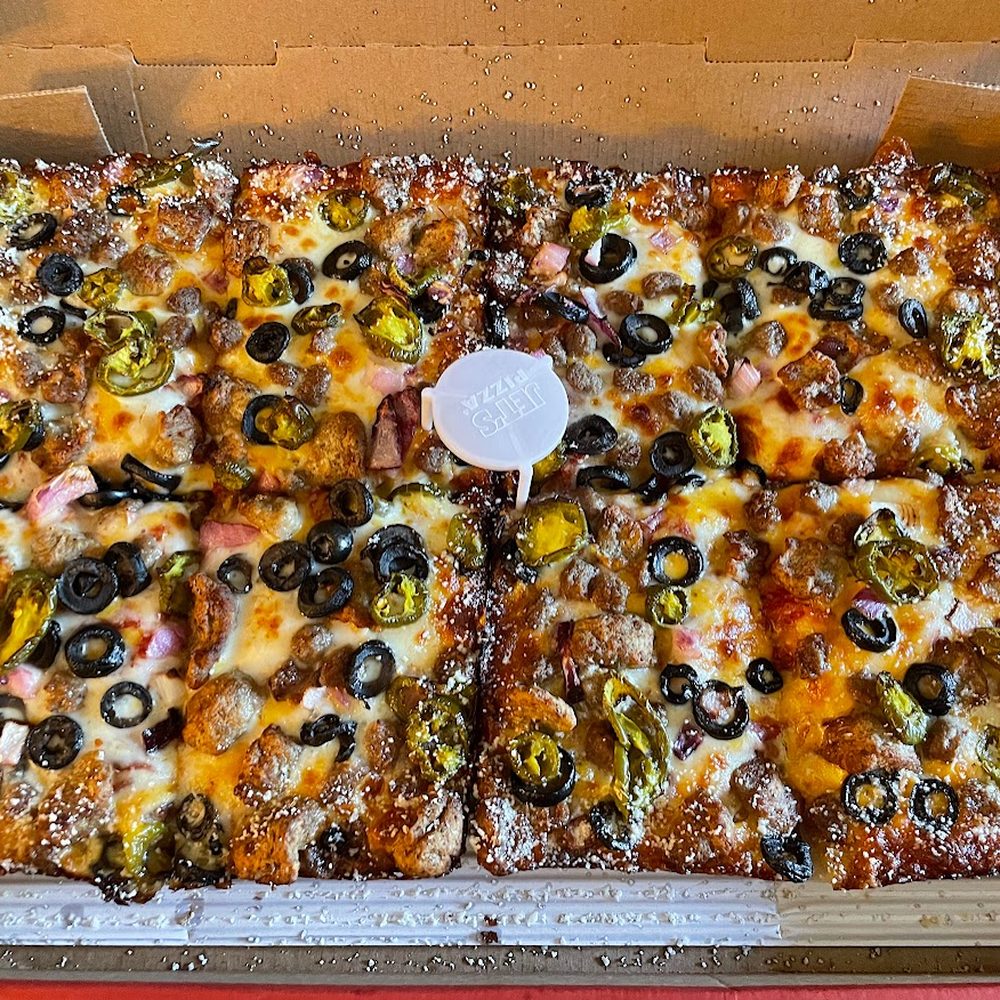 Custom 8-corner Detroit style with cajun crust, sausage, beef, red onions, black olives, jalapeno and cheddar... Custom 8-corner Detroit style with cajun crust, sausage, beef, red onions, black olives, jalapeno and cheddar...