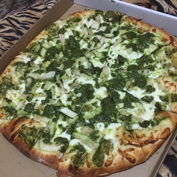 Monstros Pizza - 16" with pesto sauce with chicken and chopped garlic on top. This is my favorite spot for pizza in Chico just make sure to call ahead - Pizza Near Me - Chico, California Monstros Pizza - 16" with pesto sauce with chicken and chopped garlic on top. This is my favorite spot for pizza in Chico just make sure to call ahead - Pizza Near Me - Chico, California