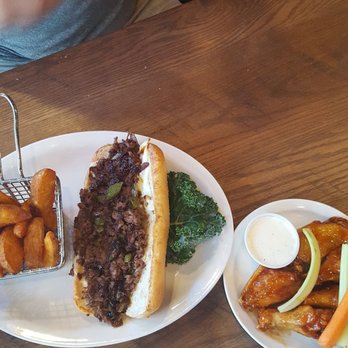 Anchor Bar - Phili cheesesteak sandwich with fries and wings in bourbon bbq sauce. - Chicken Wings Near Me - San Antonio, Texas Anchor Bar - Phili cheesesteak sandwich with fries and wings in bourbon bbq sauce. - Chicken Wings Near Me - San Antonio, Texas