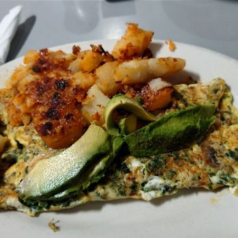 Pearl Street Diner - Omelette with home fries and avocado on top. - Diners Near Me - New York, New York