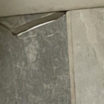Sylvania Inn - Cracked tiles in bathroom around commode. - Hotels Near Me - Sylvania, Georgia Sylvania Inn - Cracked tiles in bathroom around commode. - Hotels Near Me - Sylvania, Georgia