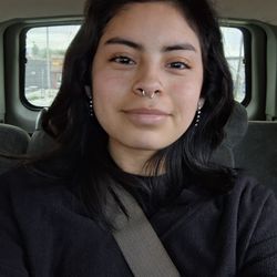 Advanced Dermagraphics Tattooing - Septum was peirced in this photo and had my right nostril pierced months before in this same destination!