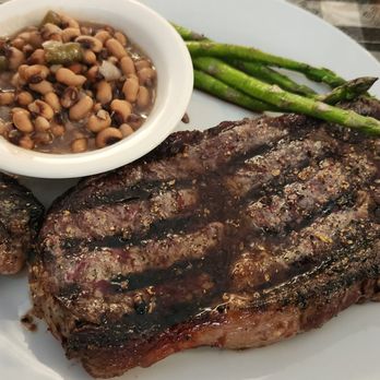 Holman Valley Steakhouse - Ribeye steak with blacked peas and asparagus. - Steakhouses Near Me - La Grange, Texas