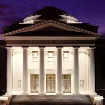 Florida Supreme Court - The front of the Florida Supreme Court Building at nightfall in Tallahassee. - Courthouses Near Me - Tallahassee, Florida Florida Supreme Court - The front of the Florida Supreme Court Building at nightfall in Tallahassee. - Courthouses Near Me - Tallahassee, Florida