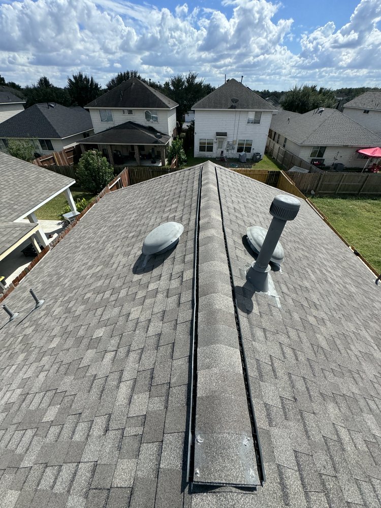Slide of DMC Roofing