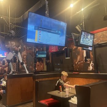 Baumhower's Victory Grille - Seating.... Lonely fella... - American Near Me - Daphne, Alabama