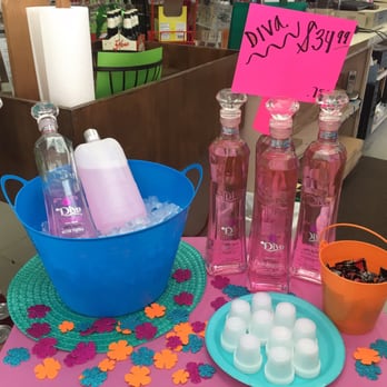 Jesse's Liquor - a pink table with a blue bowl of water and a blue bowl of ice cubes - Beer, Wine & Spirits Near Me - Corpus Christi, Texas Jesse's Liquor - a pink table with a blue bowl of water and a blue bowl of ice cubes - Beer, Wine & Spirits Near Me - Corpus Christi, Texas